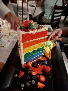 Nick & Sam's iconic Rainbow layered cake